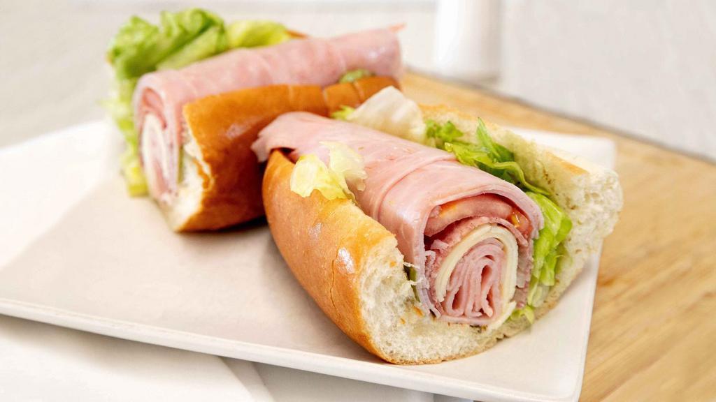 Ham & Cheese · Polish ham, provolone cheese, lettuce, tomatoes and oil.