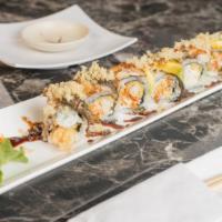 Crunch Dragon (8 Pcs) · shrimp tempura, crab, topped with eel, avocado, eel sauce and crunch.