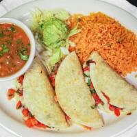 Grilled Tacos · Three grilled tacos with corn tortilla, Monterrey melted cheese and pico de gallo. Served wi...