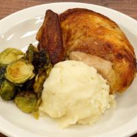 1/4 White Rotisserie Chicken Meal (2 05639 00000) · Includes choice of two sides and a dinner roll.