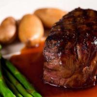 Steak Diane · Tenderloin medallions gently sautéed with garlic, shallots & mushrooms, finished off with co...