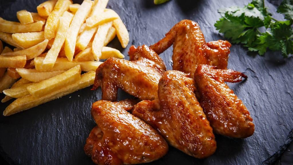Bbq Wings With Fries · Hot & Crispy Chicken wings, seasoned and fried to perfection, and tossed in BBQ sauce. Served with a side of Fries.