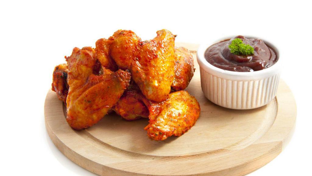 Mild Wings · Hot & Crispy Chicken wings, seasoned and fried to perfection, and tossed in Mild hot sauce.