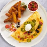Mexican Omelette  · Three eggs, cheese, onion, green pepper, tomato, and chili cooked as an omelette served with...