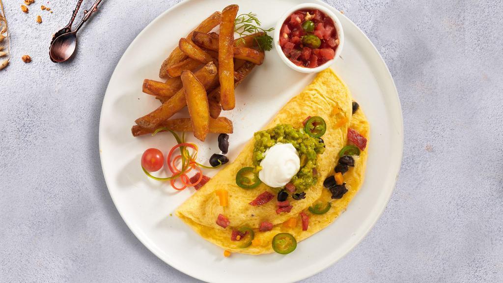 Mexican Omelette  · Three eggs, cheese, onion, green pepper, tomato, and chili cooked as an omelette served with hash brown, toast, and jelly.