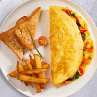 Chili Omelette · Three eggs topped with our famous chili and onion cooked as an omelette served with hash bro...