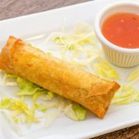 Spring Roll · One piece. Cabbage, carrot and bean thread noodles wrapped in spring roll wrap paper. Served...
