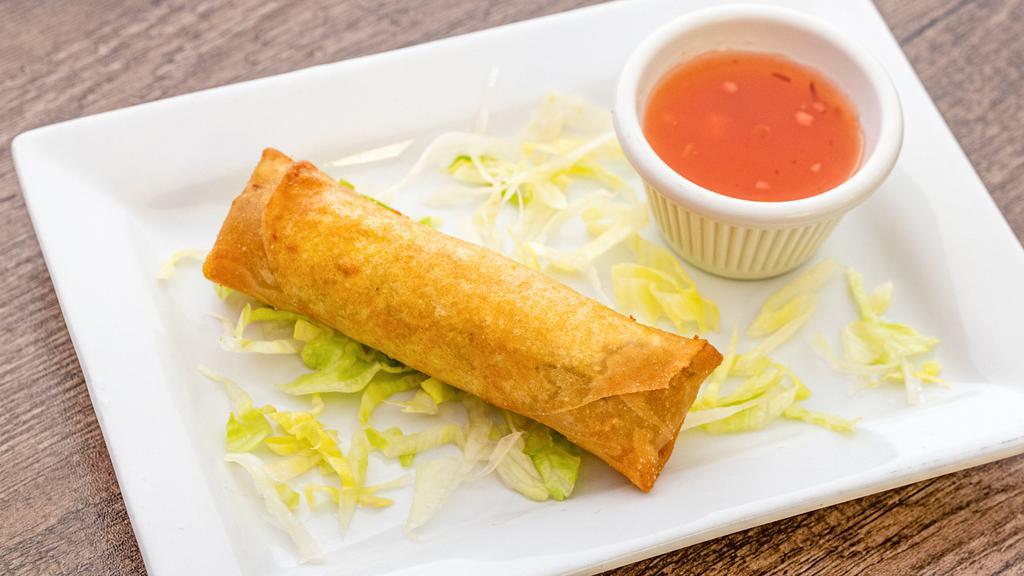 Spring Roll · One piece. Cabbage, carrot and bean thread noodles wrapped in spring roll wrap paper. Served with plum sauce.