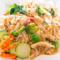 Drunken Noodles · Stir-fried wide rice noodles, Chinese greens, broccoli, green and red bell peppers, egg, gar...