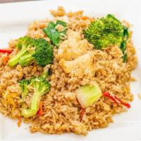 Basil Fried Rice · Fried rice, egg, Chinese greens, green and red bell peppers, onions. Garlic, basil, and broc...