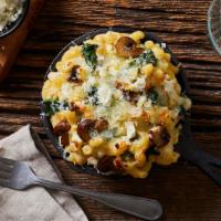 Spinach And Feta Mac And Cheese · Elbow macaroni with our classic cheese blend, spinach, feta, and olives.