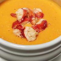 Lobster Bisque · Sherry poached lobster.