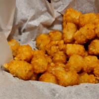Cheese Curds · White Wisconsin cheddar curds. Served with ranch.