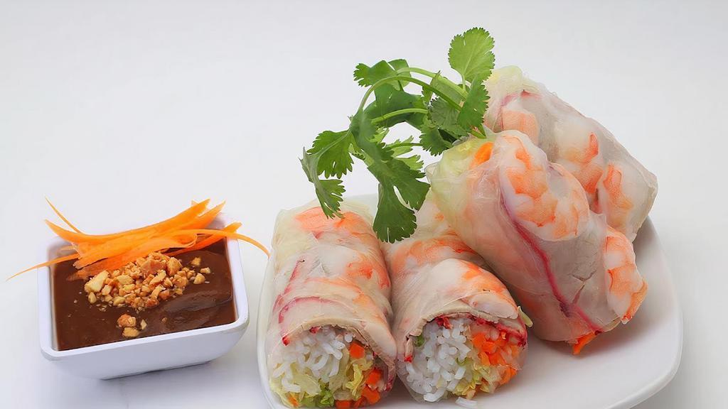 Fresh Spring Rolls (2) · Fresh spring rolls filled with lettuce, cilantro, pickled carrots wrapped in a steamed rice wrap served with peanut sauce.