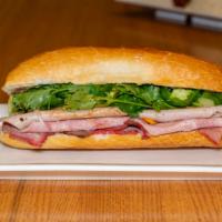 Banh Mi Sandwiches · Filled with a choice of your protein, cilantro, cucumber, jalapeno, mayo, pickled daikon and...
