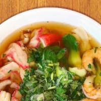 Special Wonton Soup · Clear vegetarian broth served with egg noodles, pork wontons, seafood, green onions, and cil...