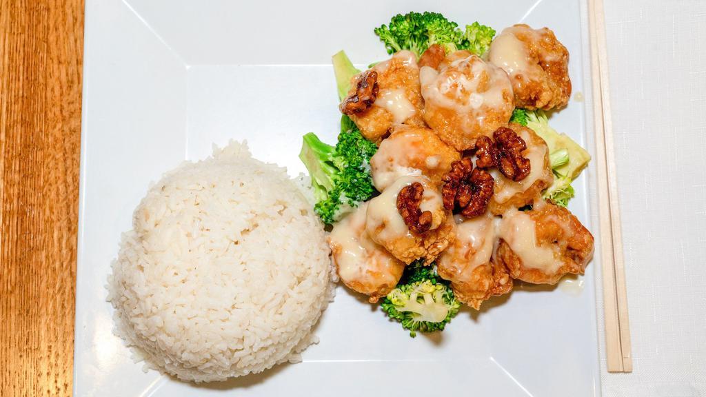 Walnut Shrimp · Crispy shrimp stir fried with broccoli and sugarcoated walnut topped with sweet mayo.
