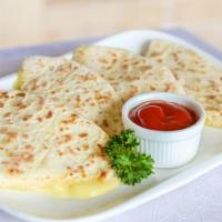 Cheese Naan · Buttery naan stuffed with paneer.