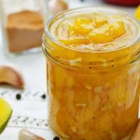 Mango Chutney · A sweet dip made with fresh mango and spices.