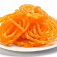 Jalebi · A popular Indian sweet made by deep-frying a buttery flour batter in circular shapes, and so...