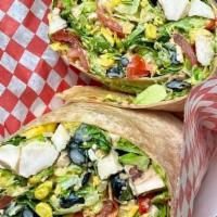 Southwest Wrap · Romaine and iceberg lettuce, cherry tomatoes, corn, black beans, roasted red peppers, red on...