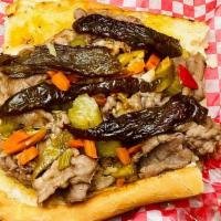 Italian Beef · Classic Chicagoland staple of thinly sliced beef and a zesty au jus on our house baked frenc...