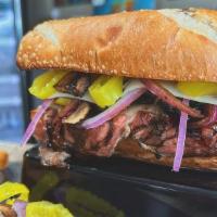 The Duke · Galley roasted beef, provolone hot capicola, sautéed mushrooms, red onions, banana peppers, ...