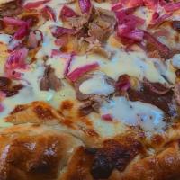 Beef Stroganoff Pizza · Hand stretched Orsi's dough, parmesan garlic sauce, fresh house roasted beef, mozzarella che...
