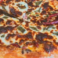 Italian Twister Pizza · Hand stretched Orsi's dough, nacho cheese, fiorucci hot capicola, Genoa salami, Fiorucci pep...