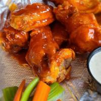 Buffalo Wings (Medium) · Jumbo wings tossed in our Classic Buffalo sauce.