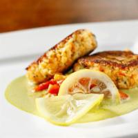 Crab Cakes · Citrus beurre blanc, marinated peppers, preserved lemon.