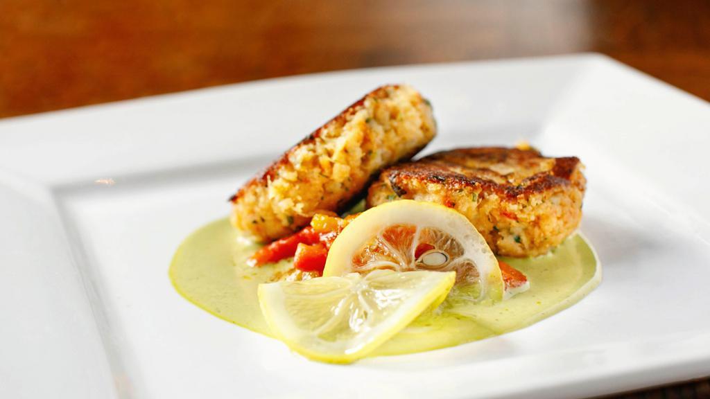 Crab Cakes · Citrus beurre blanc, marinated peppers, preserved lemon.