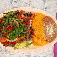 Fajitas · A combo with 5 tortillas, rice and  beans with a choice of meat mixed with red and green bel...