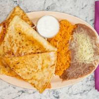 Quesadilla Combo  · A quesadilla severed with rice and beans and choice of meat.