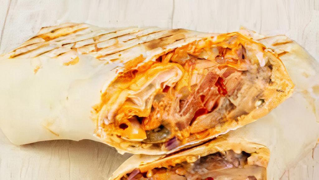 Kid'S Burrito · Served with rice, beans, cheese, sour cream and choice of meat.