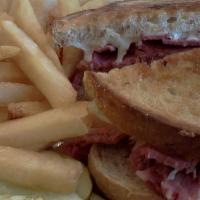 Clubhouse Sandwich
 · Triple Decker Sandwich with Fresh Turkey, ham, bacon, American Cheese, mayo, lettuce and tom...