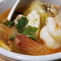Tom Yum / Thai Hot & Sour Soup · Recommended. Chicken broth, mushrooms, Thai herbs, chilies paste, lime juice and fresh chili...