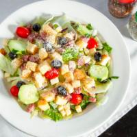 Al'S Salad · Iceberg and romaine lettuce, salami, provolone cheese, black olives, croutons, tomatoes and ...