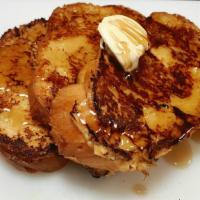 French Toast · House made challah bread dipped in a fresh made mix with a side of maple syrup and butter.(F...