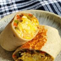 Bk Burrito Deluxe · Scrambled eggs, Chihuahua cheese, refried pinto beans, home fries, sauté veggies and red sal...