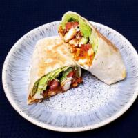 Buffalo Wrap · Grilled chicken tossed with house made buffalo sauce, lettuce, celery, tomatoes, blue cheese...