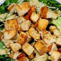Caesar Salad · Lettuce and Parmesan cheese tossed with house made Caesar dressing topped with croutons.