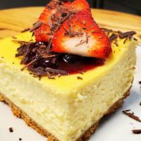 Cheesecake Delight  · House made cheesecake garnish with fresh organic tripleberry compote, fresh strawberries and...
