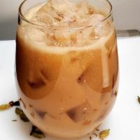 Coconut Chai · Rich and smooth chai made with organic coconut milk, house made ginger syrup, almond milk an...
