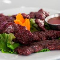 Ap2 Thai Style Beef Jerky · Beef tenderloin marinated in Thai spices & dried over slow heat