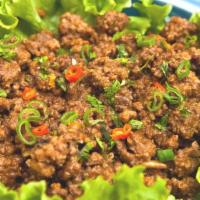 #20 Laab Esan · Chopped beef, chicken, or tofu with lemon juice, cilantro, chili, green onion & powdered roa...