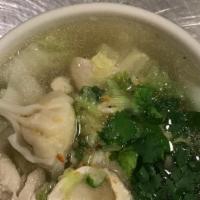 #14 Wonton Soup · Chicken wontons & napa in chicken broth. Topped with green onions and cilantro.