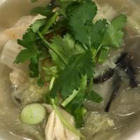 #17 Silver Thread Noodle Soup · Noodles with black mushrooms, napa cabbage & onions. Gluten-Friendly
