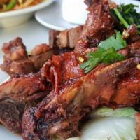 #43 Full Thai Roast Duck · Marinated in garlic, ginger, oyster sauce & soy sauce.