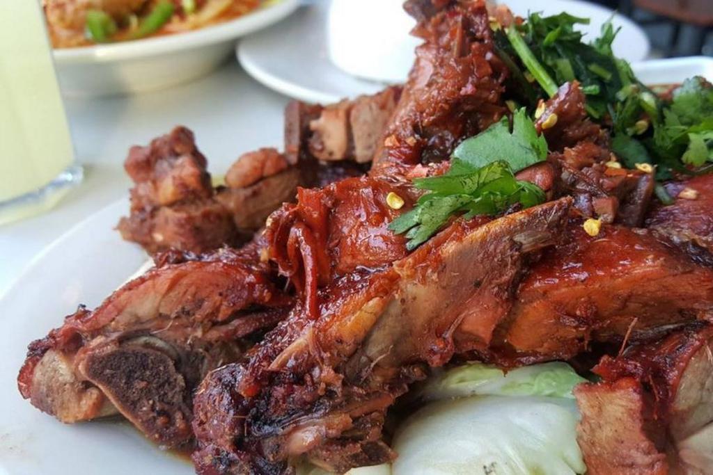 #43 Full Thai Roast Duck · Marinated in garlic, ginger, oyster sauce & soy sauce.
